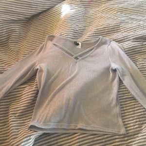 Sparkle cross neck silver sweater.